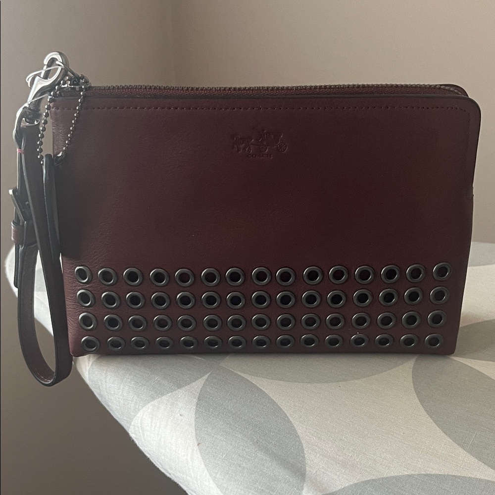Coach Maroon Wristlet with Grommet Design